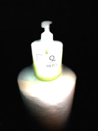 A bottle of Liquid Soap on a Paper Towel